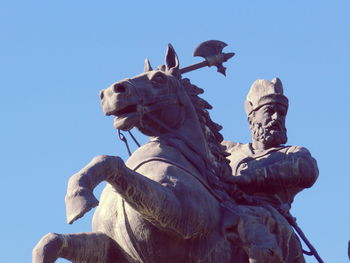 Low angle view of statue against clear sky