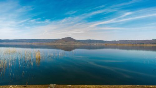 View of lake against cloudy sky