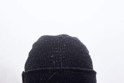 Rear view of person against sky over white background