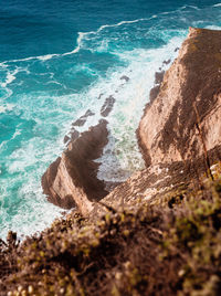 High angle view of rocks on beach