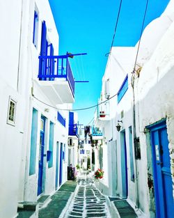 Narrow alley amidst buildings in city