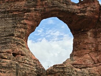 Low angle view of rock formation against sky pedra furada serra da capivara national park 