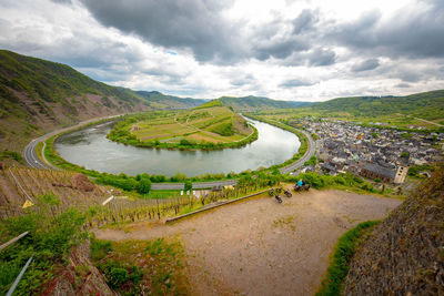 High angle view of road amidst landscape against sky