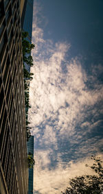 Low angle view of skyscraper against sky