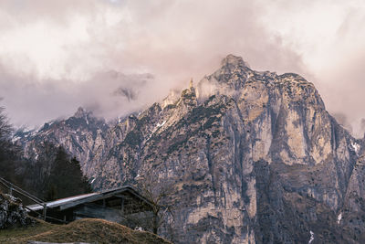 Panoramic view of snowcapped mountains against sky