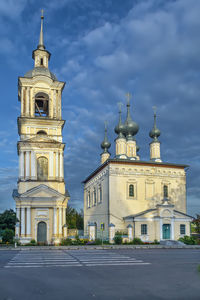 View of buildings against cloudy sky