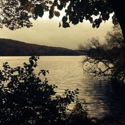 Scenic view of lake with mountains in background