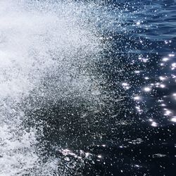 Full frame shot of snowflakes on water at night