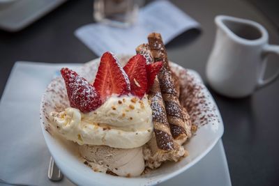 Close-up of cake slice in plate on table