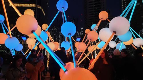 Group of people in front of buildings