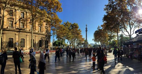 People walking on bridge