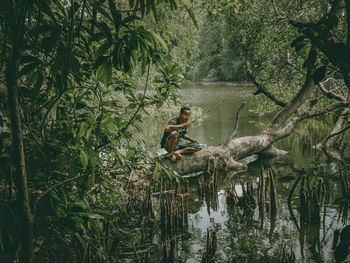 Fishing in the river, the mangrove forest jakarta indonesia 