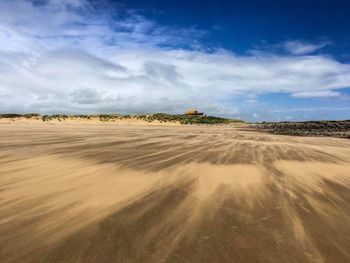 Scenic view of desert against sky