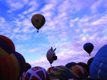 Low angle view of hot air balloons against sky