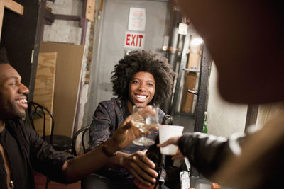 Young people hanging out backstage at a theater