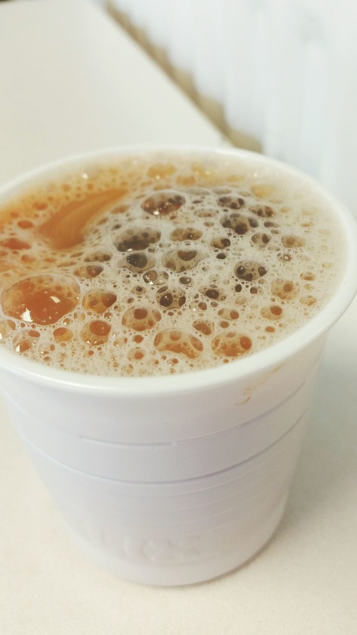 CLOSE-UP OF COFFEE ON TABLE