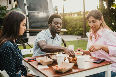 Business colleagues working at table