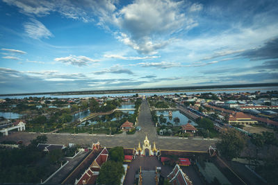 High angle view of city against cloudy sky