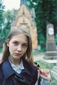 Portrait of beautiful woman standing outdoors