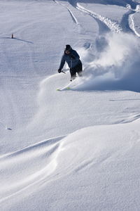 Man skiing in snow