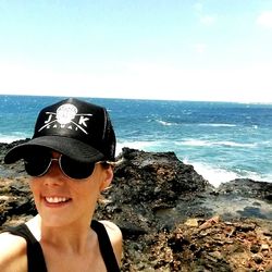 High angle view of woman standing on beach