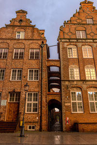 Low angle view of buildings against sky