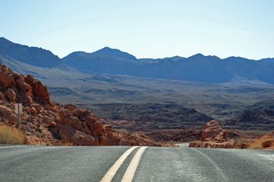 Road leading towards mountains