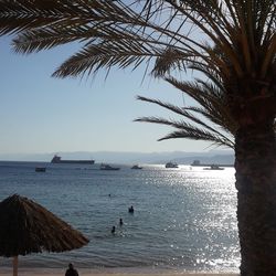 Scenic view of calm sea against clear sky