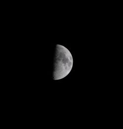 Low angle view of moon against sky at night