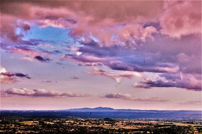 Aerial view of landscape against sky at sunset