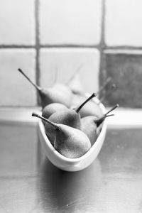 Close-up of fruits in bowl on table