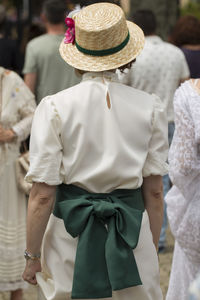 Rear view of woman wearing hat