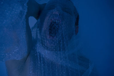 Man swimming in pool