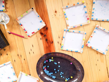 High angle view of multi colored pencils on table