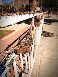 High angle view of sidewalk by street in city