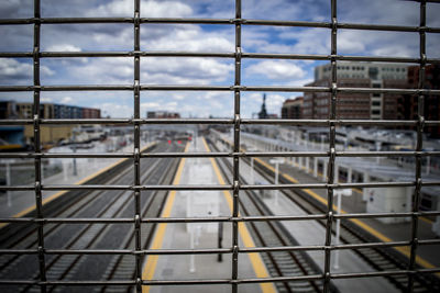 Close-up of sky seen through glass at a train station