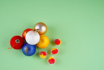 Close-up of christmas decorations against blue background