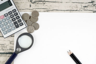 High angle view of pen on table against white background