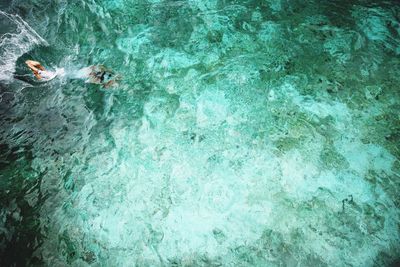 High angle view of person diving into sea