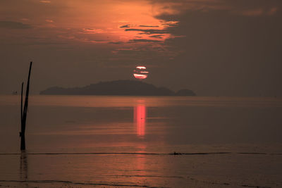 View of calm sea at sunset