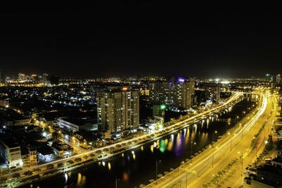 Illuminated cityscape at night