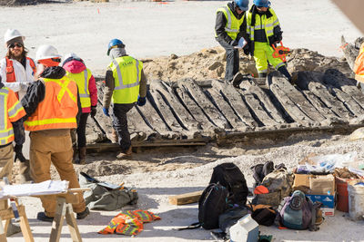 Rear view of construction workers