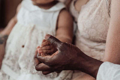 Close-up of hand holding hands