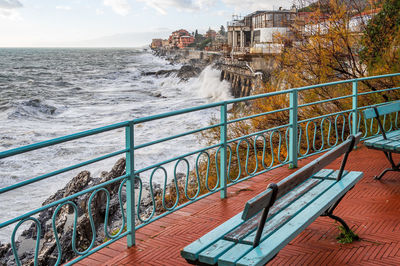 Waves on the promenade on the cliffs of nervi, in the outskirts of genoa, italy