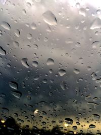 Close-up of water drops on glass