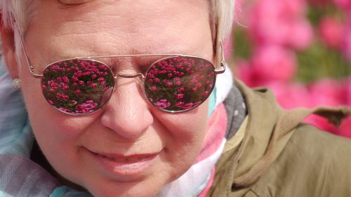 Portrait of woman wearing sunglasses