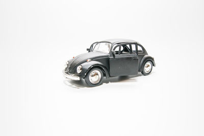 Close-up of toy car against white background