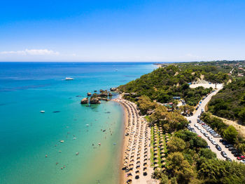 High angle view of sea against blue sky