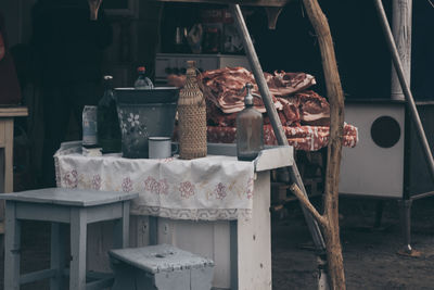 Containers on table in old room