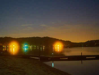 View of calm lake at sunset